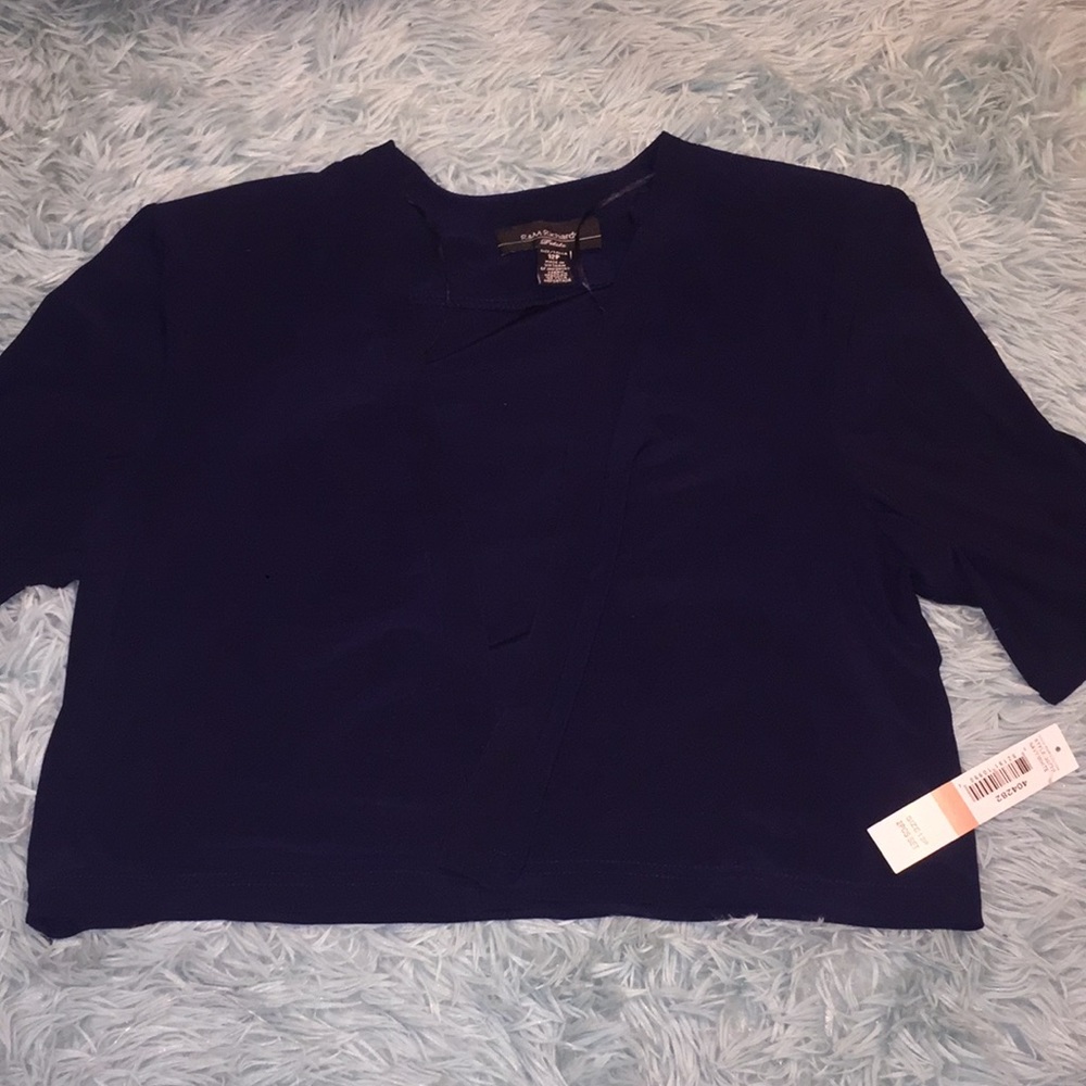 Dark blue short sleeved jacket .